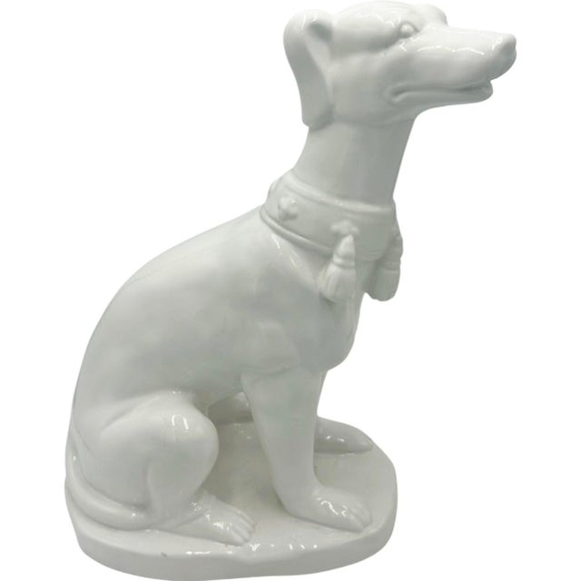 Details: -This charming glazed white ceramic greyhound is perfect for indoor decor! -Dog features charming collar with...