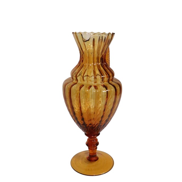 Chic Hollywood Regency art glass carafe, made in Italy by Empoli circa 1960's. The pitcher features an applied handle of...