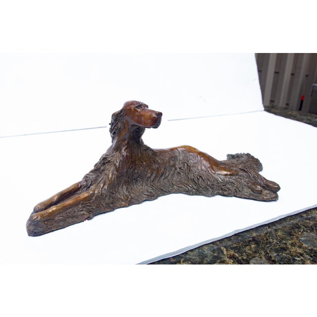 Irish setter with a fabulous coat. Patinated bronze. Illegibly signed. Dated '81.