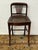 Design Plus Gallery presents an Antique Edwardian Mahogany Fan Back Cane Seat Side Chair. Dating to the early 20th...