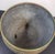 The warmth of brass overtones, this vintage mid-20th-century tripod jardinier planter combines functionality, beauty, and...