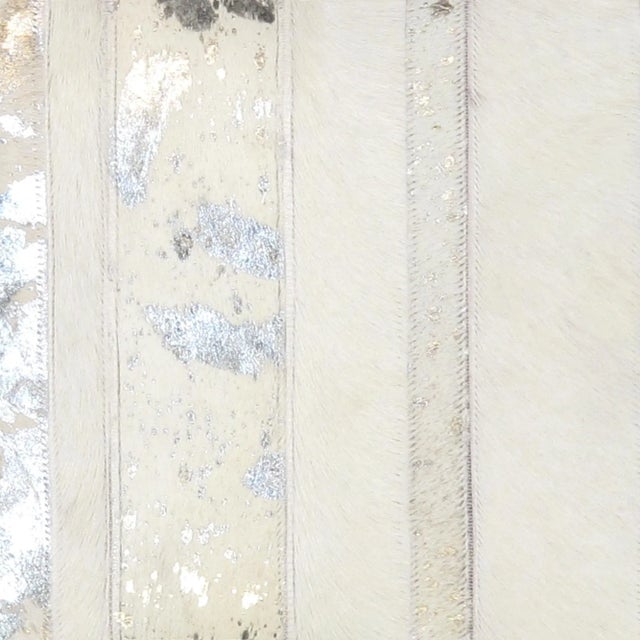 This luxurious Cowhide Throw Pillow is hand-cut and hand-stitched. Each panel is carefully selected for rich color and...