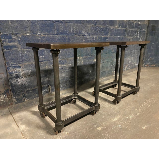 A single early 20th century Turtle tables from a defunct print shop. Excellent patina on these iron & steel table. It is...