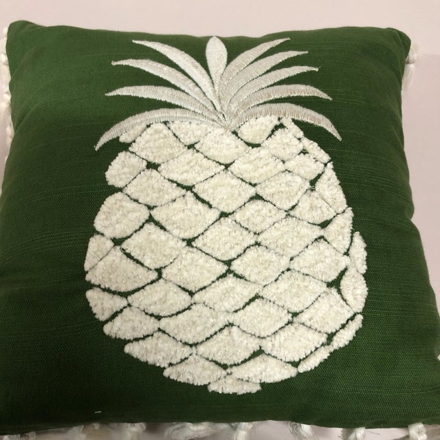 Lovely green and white embroidered square pillow with pineapple motif on front. Tassel trim around the pillow. Zipper...