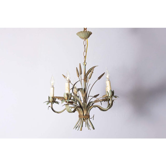 This exquisite 20th-century French chandelier, inspired by the timeless elegance of Coco Chanel, features a delicate...