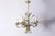 This exquisite 20th-century French chandelier, inspired by the timeless elegance of Coco Chanel, features a delicate...