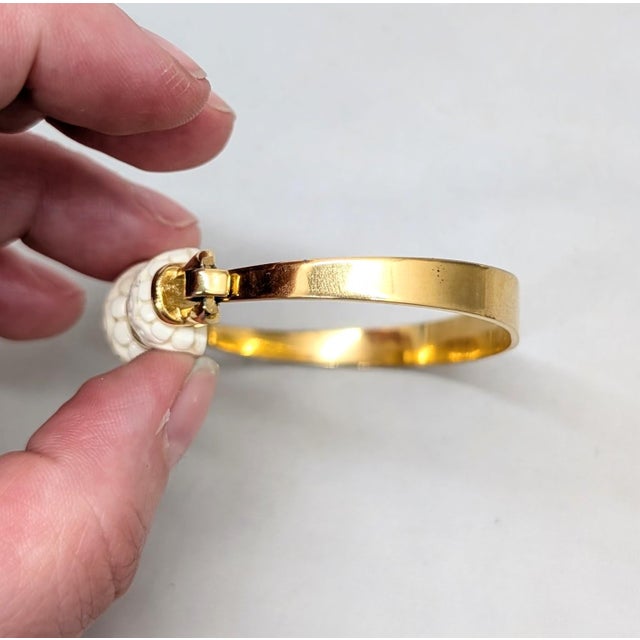 Metal Vintage Signed Crown Trifari Goldtone Carved Faux-Ivory Cuff Bracelet For Sale - Image 7 of 12