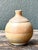 This vintage studio pottery vase is a refined example of mid-20th-century artisanal craftsmanship, celebrating the beauty...