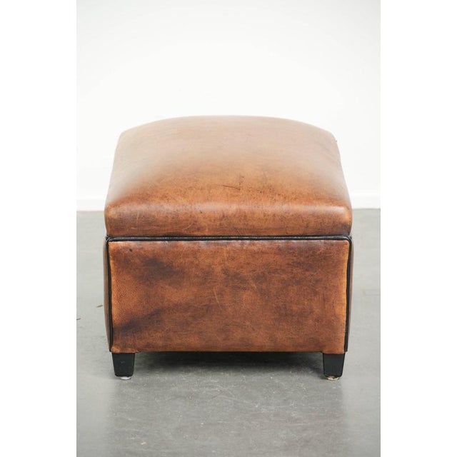 Sheepskin Ottoman with Black Piping For Sale - Image 3 of 9