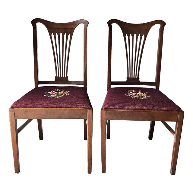 Pair American Mahogany and Needlepoint Upholstered Chairs, Pair. Measures 20" in width, 20" in depth, 38" in height with...