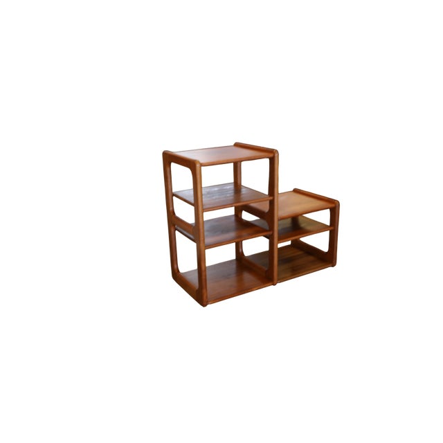 An exclusive and very well-built bookcase in solid teak, made by Dyrlund Denmark, one of the most reputable Danish...