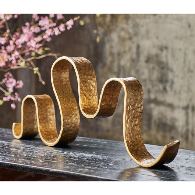 Our dynamic large Wave Sculpture captures the energy of movement in a freeze frame. Like a beautiful ribbon dancer, this...