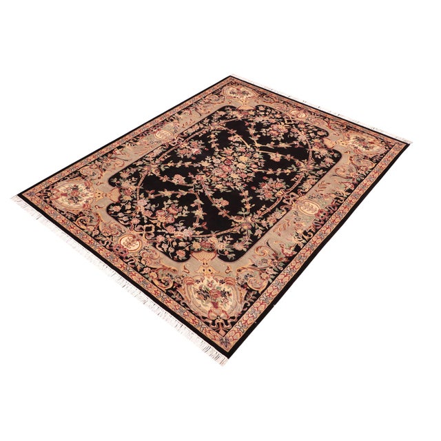 Designed with mesmerizing intricacy and gorgeous color palette, this hand-knotted masterpiece demonstrates the beauty and...