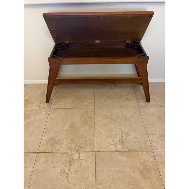 Great vintage 1970s solid wood lift-top organ bench. This mid-century accent or console tables original purpose was a high...