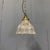 Beautiful small pressed glass holophane pendant lamp from France, 1930s. Fitted with a brass fixture with an E27 socket...