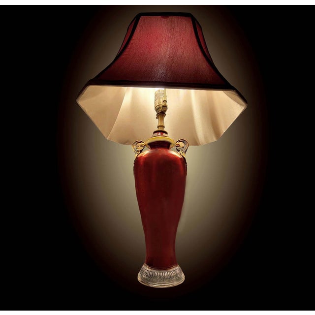 Stunning Oxblood Porcelain Ginger Jar Handled Table Lamp A perfect blend of function and style, this lamp features a...