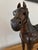 One of the larger of this type we have seen, this vintage rustic pieced leather horse sculpture features inset glass eyes....