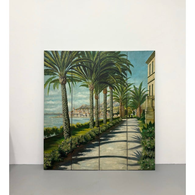 A decorative four-panel folding screen featuring a hand-painted coastal landscape with towering palm trees, a waterfront...
