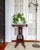 This ornate Eastlake Victorian parlor table, plant stand, or side table boasts an ornate apron and its original soapstone...