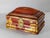 We are offering this very red and very pretty box. We believe this box to be French, but could be English, it has red...