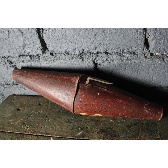 This red tobacco carrot is a unique collector's item, hand-painted with the inscription "TOBACCO." The old paint, cracked...