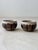 Two identical ceramic bowls designed by Gabriel Fourmaintraux in the 1950s. This unique set demonstrates how craftsmanship...