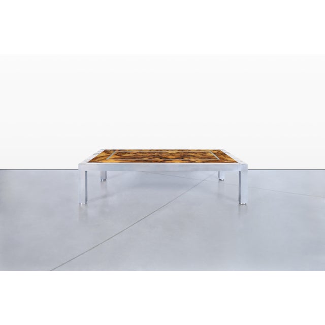 A striking example of 1970s American craftsmanship, this monumental coffee table commands attention with its bold scale...