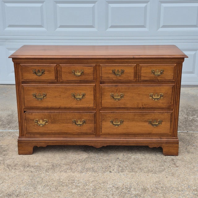 This is a mid-20th century solid maple 6-drawer dresser by American furniture maker Heywood Wakefield. The dresser...