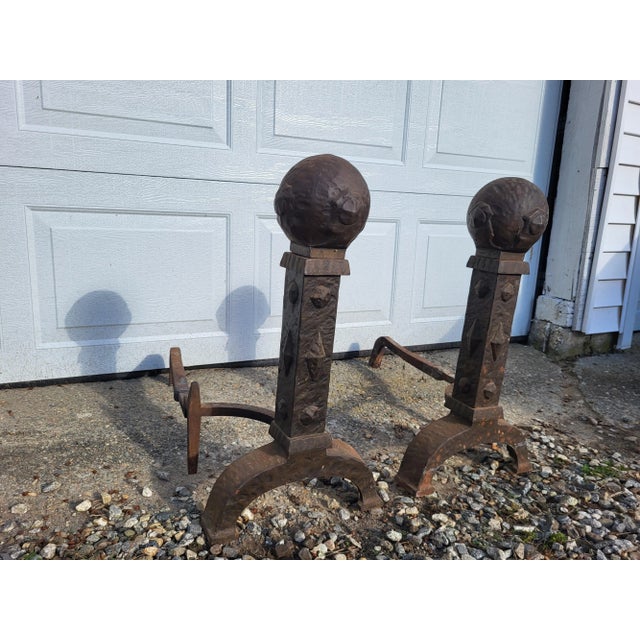 Amazing pair of large mission or arts and crafts metal andirons. Each andiron measures 26" deep, just under 13" wide on...