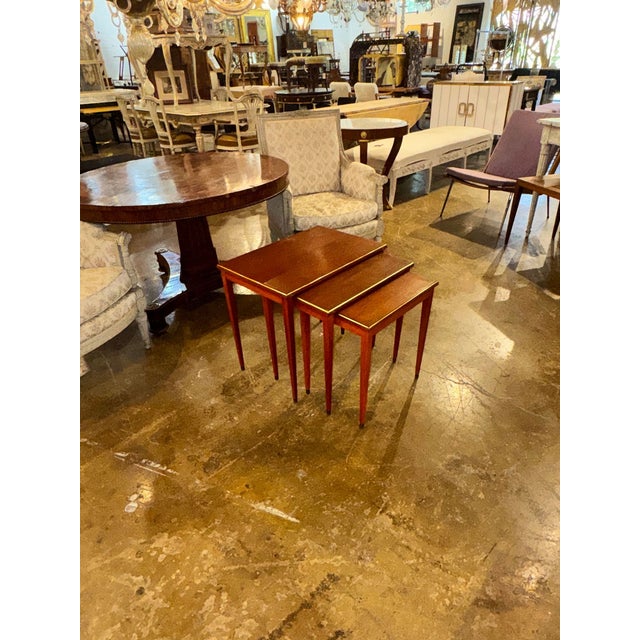 The Danish MCM Nesting Tables are a stylish and functional addition to any living room. With a sleek design and a table...