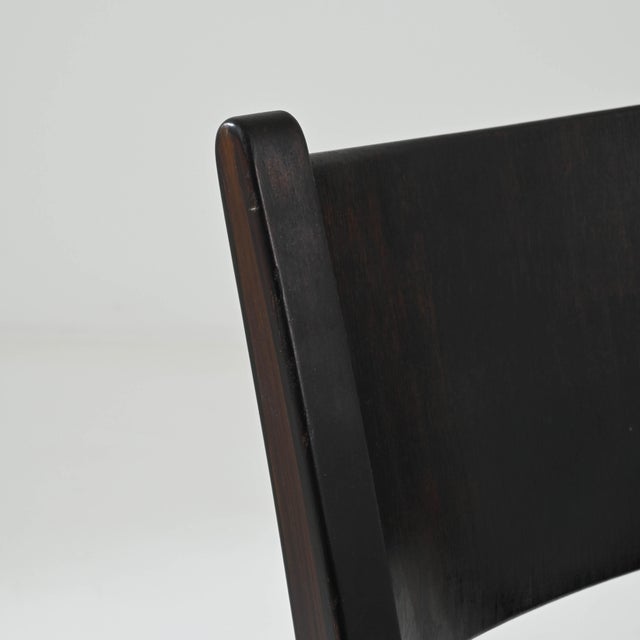 Introducing our exquisite 20th Century German Wooden Dining Chair, a timeless piece that effortlessly blends classic...