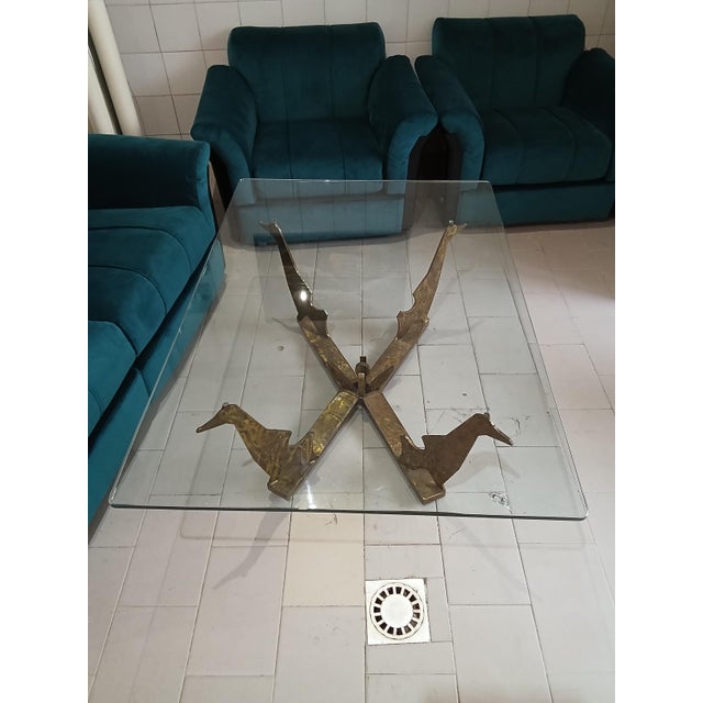 Sculptural coffee table by Tuscan artist Enzo Pazzagli. The euro has small chips on one side and signs of wear on the...