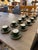 Design Plus Gallery presents a Set of 10 Green + Gold Bistroware Porcelain Demitasse/Espresso Cups + Saucers from Apilco....