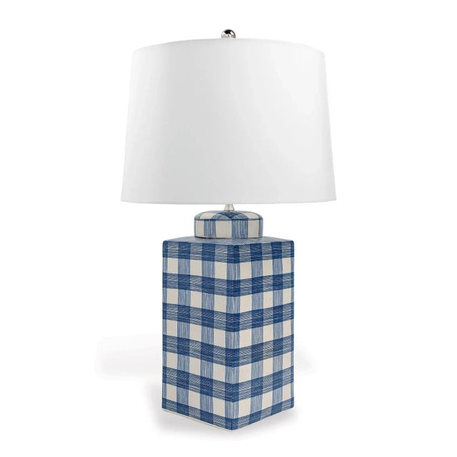 Like the timelessly chic island that inspired its name, the Nantucket lamp by Madcap Cottage is a study in classic...