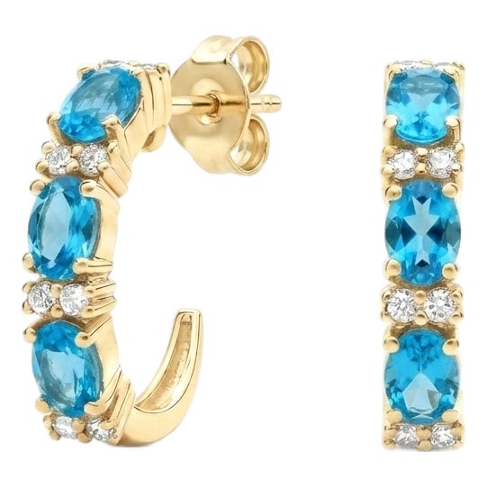 Elegant Swiss Blue Topaz Huggies Hoops | December Birthstone Earrings - A Pair For Sale