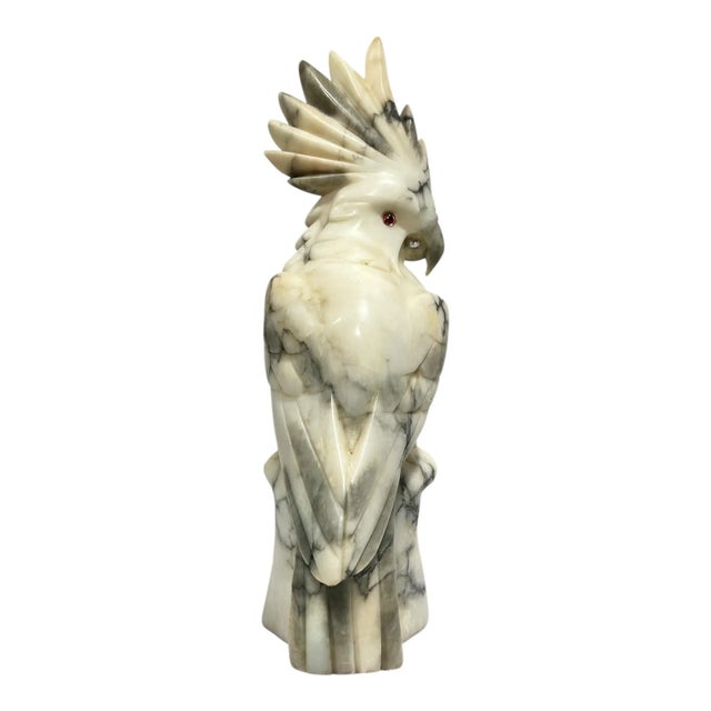 Cockatoo parrot sculpture carved from alabaster stone measuring 19 1/4 by 6 by 9 inches. Apparently unsigned.