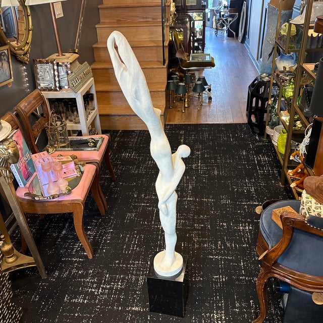 This sculpture designed by David Fisher and produced by Austin productions was created in 1980. This beautiful piece is...