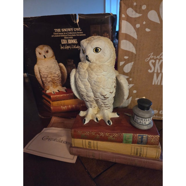 Includes original box and paperwork. The Beautiful Ezra Brooks Empty Whiskey Decanter from 1979 features a snowy white owl...