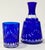 Vintage Bohemian cut to clear cobalt blue bedside decanter and tumbler set. Early 20th C (1911-1940) set from the renowned...