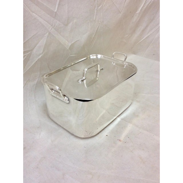 This 20th Century French Hotel Silver Silverplate Covered Roaster features two riveted handles on each end. Having a...