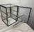 This antique handmade metal mounted glass countertop store showcase is a unique and charming display. Made in the United...