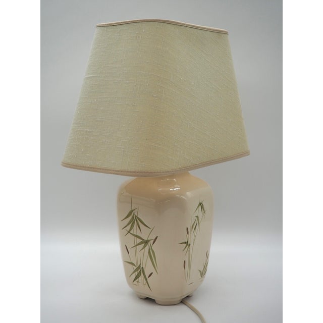 A lovely vintage rare ceramic table lamp in a design inspired by the nature. Beautiful motifs of a crane bird and grass...