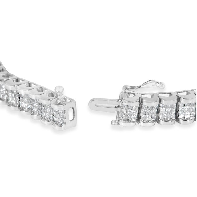 Indulge in the luxury of this stunning 14K white gold princess-cut diamond link bracelet. With a total of 405 natural...