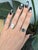A 3.25-carat London blue topaz pools with deep, inky blue at the centre of this solid 14K rose gold ring, accented by six...