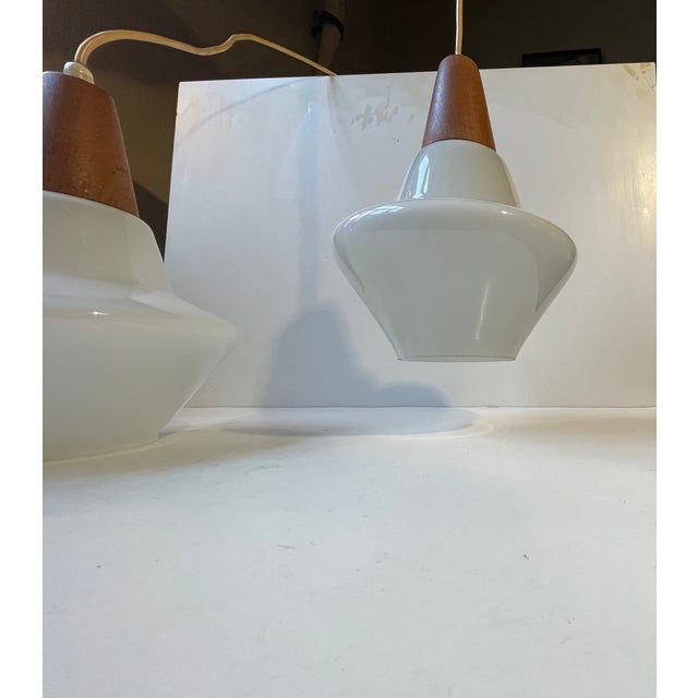 Holmegaard Danish Modern White Opaline Glass and Teak Pendant Lamps by Holmegaard, 1960s, Set of 2 For Sale - Image 4 of 11