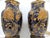 This is a pair of antique French porcelain polychrome faience vases with a lion rampant design, served as table lamps....