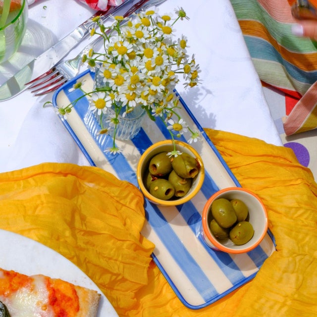 Hand-painted ceramic stoneware collection crafted in a historic factory in Civita Castellana Italy, a village where...