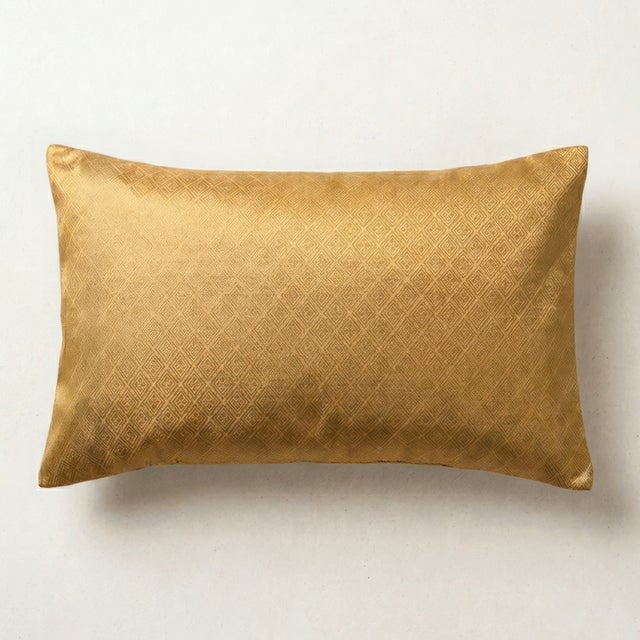 Gold. Only gold. And the geometry that makes gold speak. The Kinshi Lattice is a Japanese silk pillow handcrafted by...