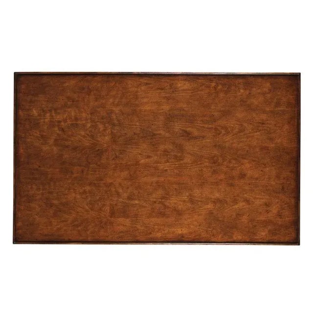 Designed in the spirit of 19th Century French originals, this table has a rectangular cherry top surrounded by a delicate...