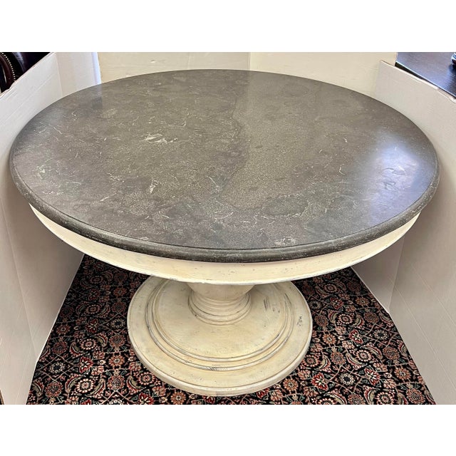 Round White Washed Pedestal Dining Table With Granite Top by Arhaus